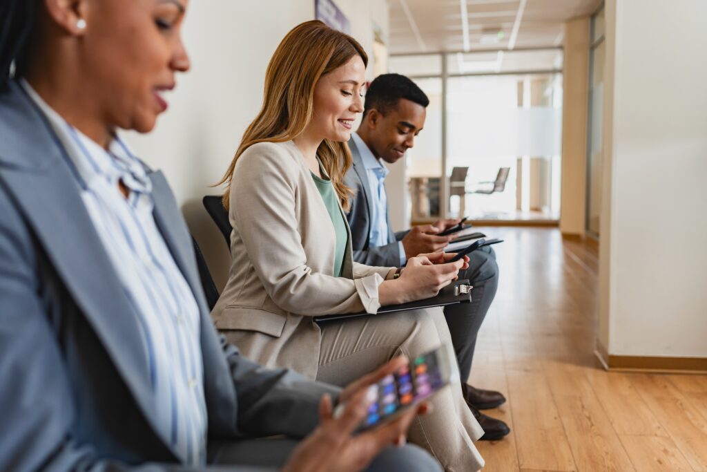 Job seekers waiting for their interview