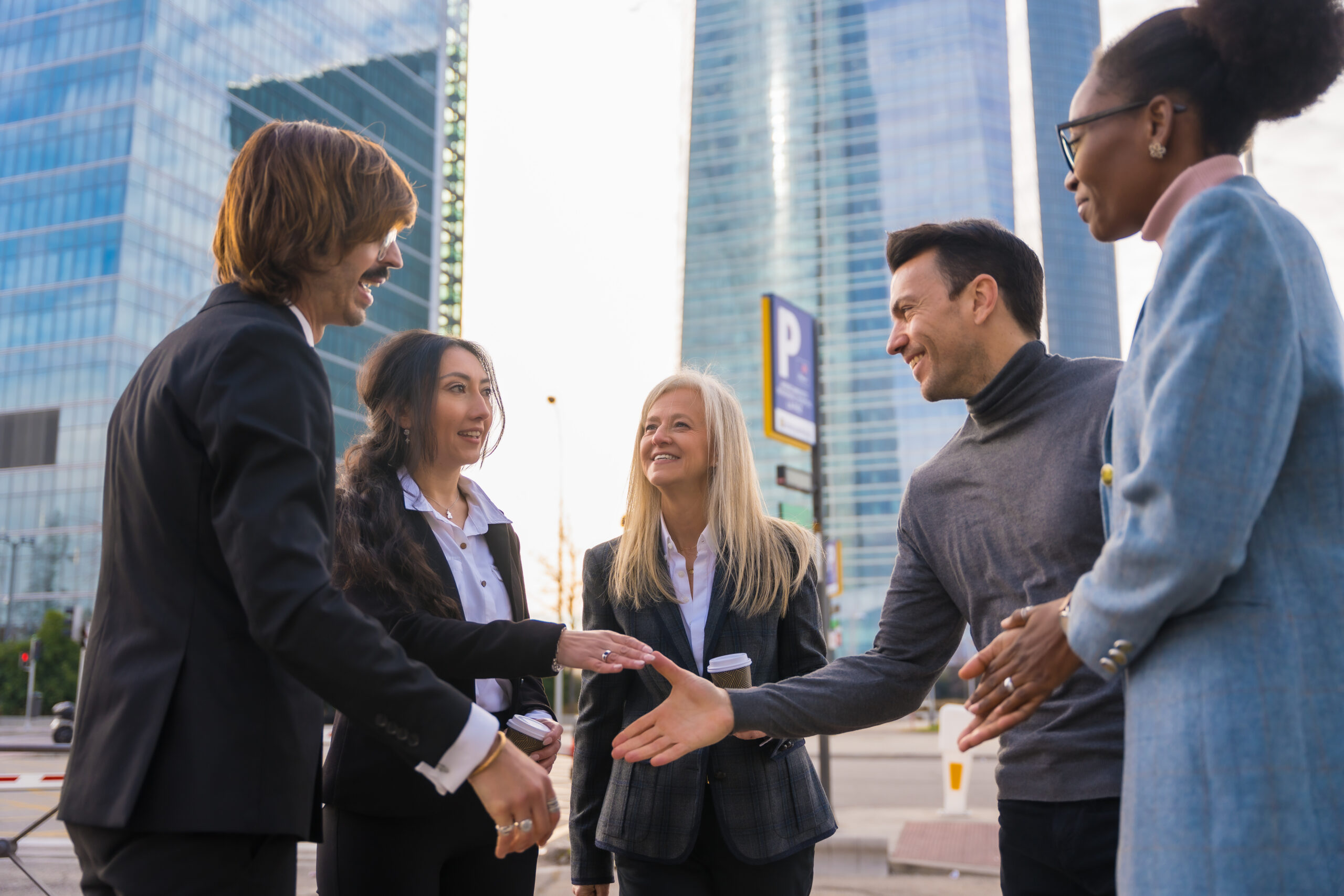 A group of happy professional with different sales careers.