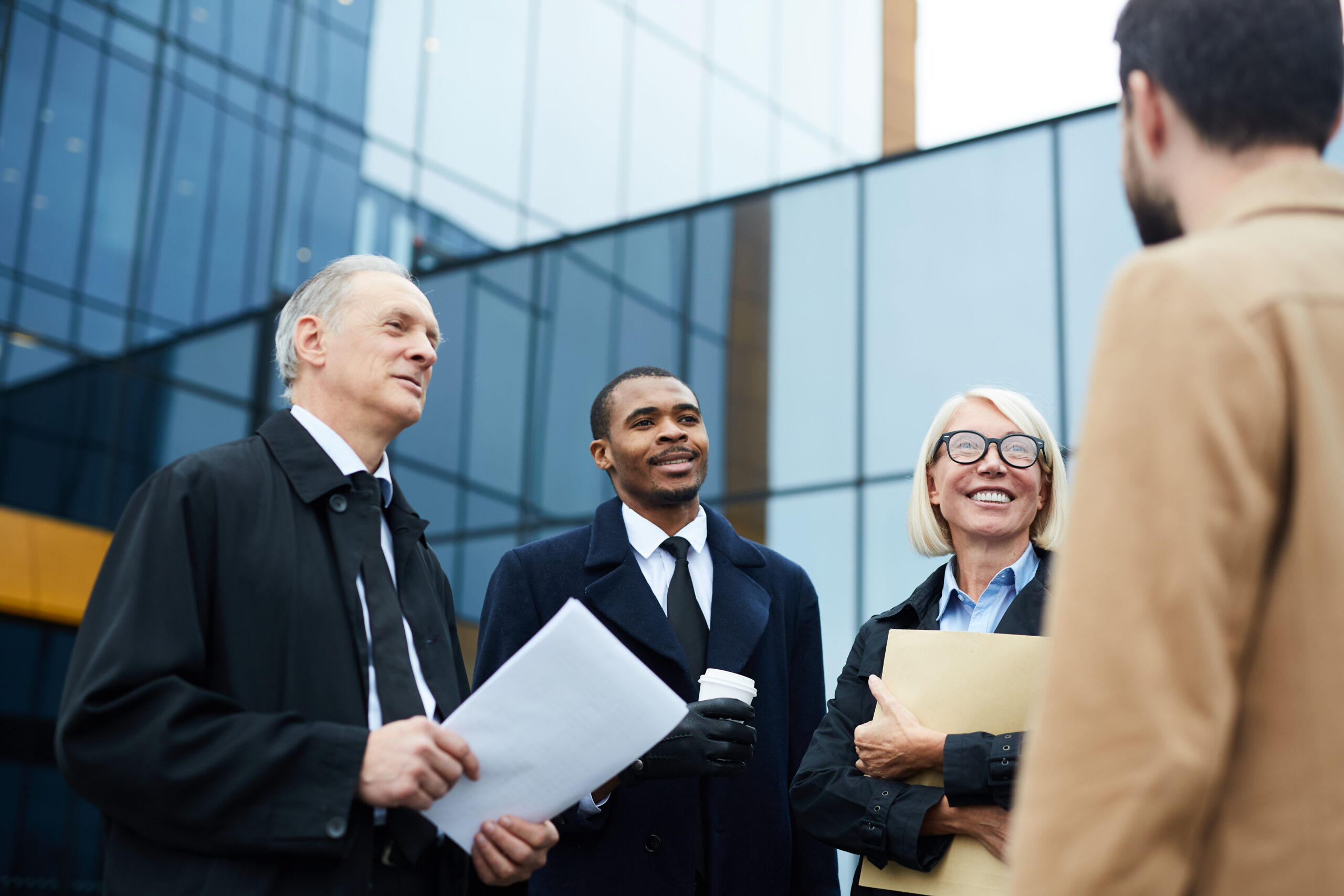 Direct marketing professionals talking to a potential customer.
