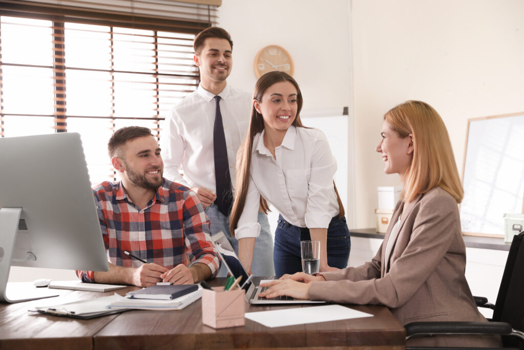 A team talking to their manager about their career stability.
